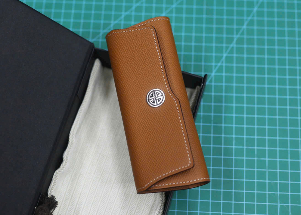 Bao da XOR cuộn ngang màu cam lót nhung Alcantara chống trầy xước màn hình